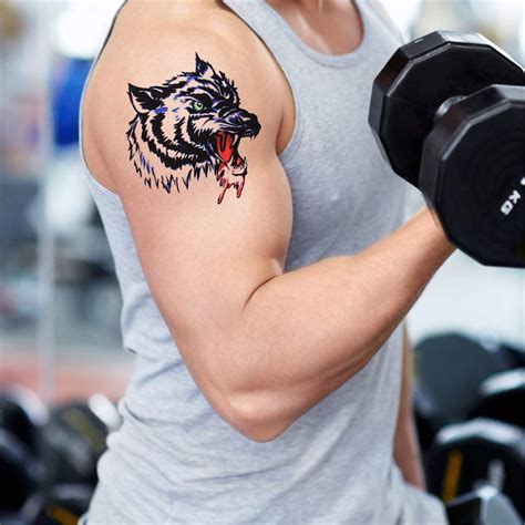 tatuajes para biceps|Los mejores diseños de tatuajes para bíceps de hombre